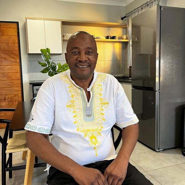 Nqobile Tshuma, estate agent